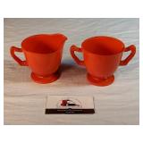 Orange glass cream & sugar