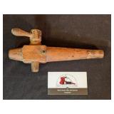 antique wooden spigot w/ aerator valve)