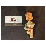 Articulating carved bottle stopper