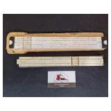2 slide rulers with cases