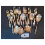 Silverplate serving forks (7), spoons (7)