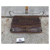 Antique wood Bissell sweeper