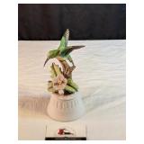 Ceramic hummingbird music box