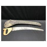 Vintage Saw in Sheath