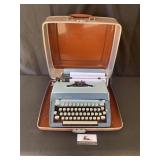 Vintage Remington typewriter and case