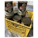 Northland Oil cans in milk crate