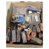 Box of vintage spark plugs
