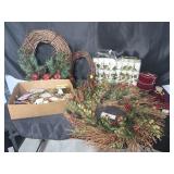 Tote of Christmas decor and wreaths