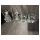 12 glasses and 2 small decanters