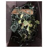 2 totes full of Christmas lights and ornaments