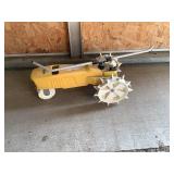 Cast iron tractor sprinkler