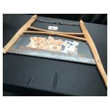 Pigs painted on vintage saw