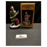 Fireman clown statue