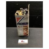 Cracker tin full of tent stakes