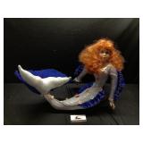 Porcelain mermaid doll