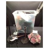 Small trash can on wheels with doll accessories