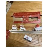 Plastic Santa Claus and his reindeer vintage