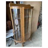 Curved glass China cabinet with three glass