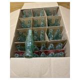 Six fluid ounce Coca-Cola bottles