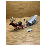 Cast iron reindeer and sleigh