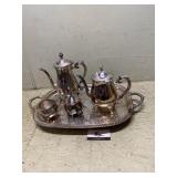 Tea set one lid is damaged