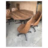 Table 4 chairs and a leaf