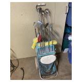 Vintage golf clubs and cart