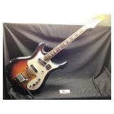 Silver tone guitar with case