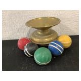 Spittoon and croquet balls