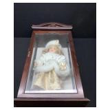 Doll in Display Case