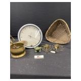 Basket, clock, frog, and brass pot