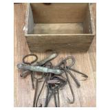 Bale hooks in wooden crate