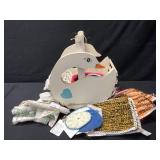 Wooden duck and potholders