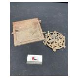 Cast iron trivet and door