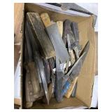 Box of knives and dustpan