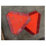 Slow moving vehicle signs