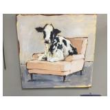 Cow on a couch wall decor