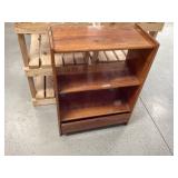 Wooden shelves with drawer.
