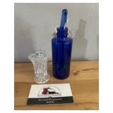Blue glass jar and small vase