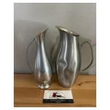 Small metal pitchers