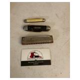 Pocket knives and harmonica
