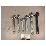 Adjustable wrenches