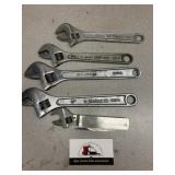 Adjustable wrenches