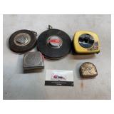100 ft tape measure and various tape measures