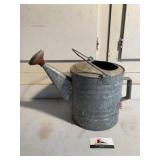 Galvanized watering can