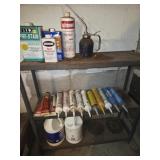 Shelf of Caulking and Pre Stain