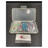 Approximately four new lamp work beads