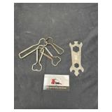 Wrench and bottle opener