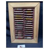 Framed vintage bullet advertising pencils