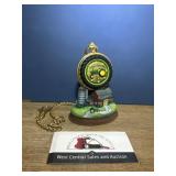 John Deere pocket watch on display stand